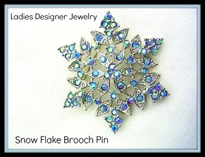 snowflakebrooch_vintagesnowflakepin_snowflakerhinestonebrooch_ladiesdesignerjewelry_wintersnowflakebrooches_holidaybroochpin_estatejewelrypin