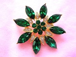 emeraldflowerbrooches_emeraldflowerpins_rhinestoneflowerpins_rhinestoneflowerbrooches_ladiesdesignerjewelry_austriancrystalflowerpins_bridaljewelrypins